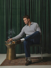 RETILIER QUARTER ZIP